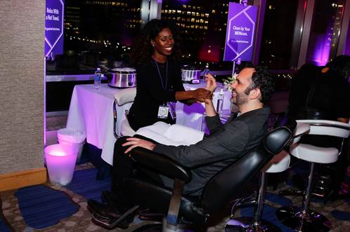 James Beard Award-winning pastry chef and Cronut® creator Dominique Ansel gets a menicure at the on-the-go beauty bar, created by fashion designer Cynthia Rowley and tech mogul and businesswoman Randi Zuckerberg, at the Hyatt Regency “It’s Good Not To Be Home" event. Photo Credit: Mansueto Ventures