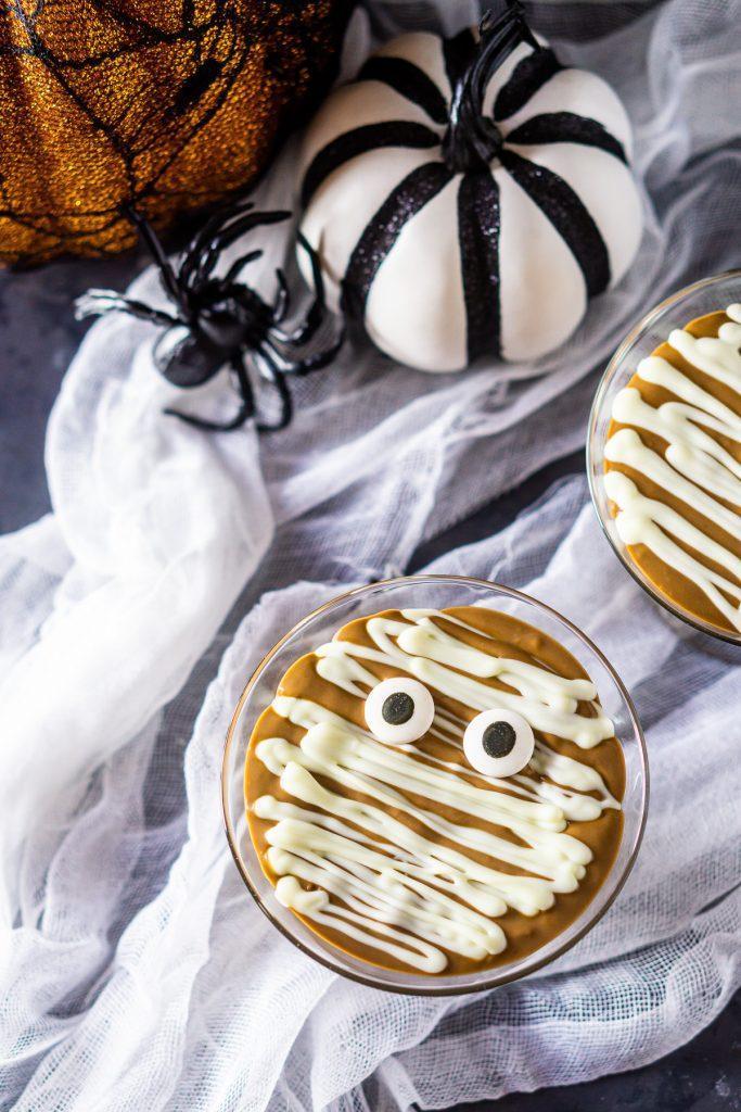 Spooky Halloween Treat Mummy Pudding Cups How cute are these pudding cups! Kids will enjoy devouring these mummy pudding cups just as much as making them. 