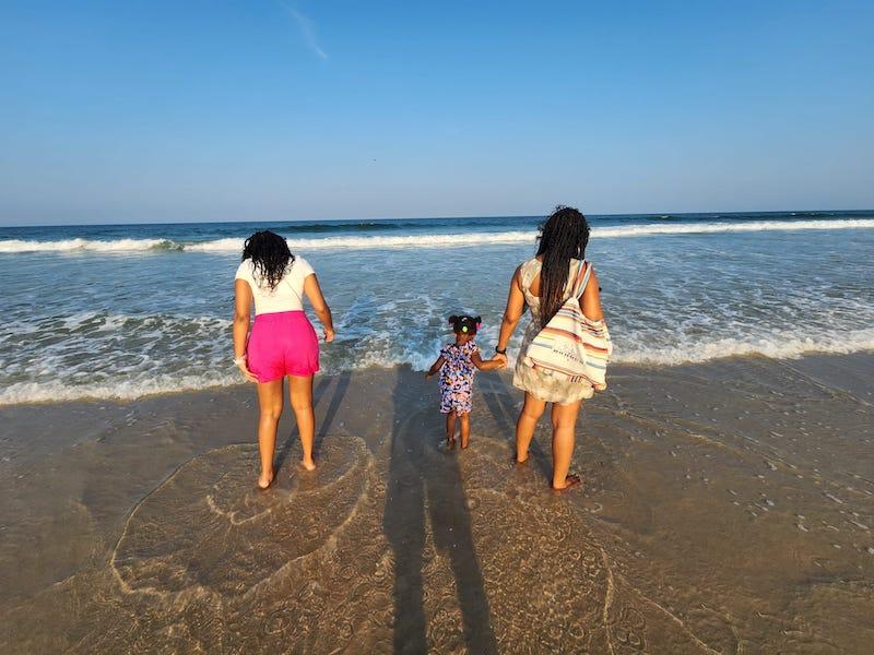 Mom with children on beach in to Lanoka Harbor, NJ