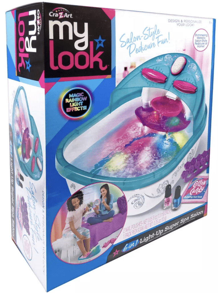 Treat her to a spa day at home with the MY LOOK 6-in-1 Light-Up Super Spa Salon Activity Kit! Featuring color-changing light effects and pampering essentials, this kit transforms any space into a luxurious salon experience. From massaging foot rollers to real polishes, indulge in relaxation and self-care with your daughter.