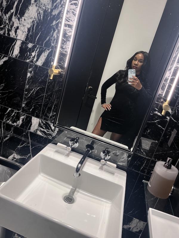 luxury couples getaway New Orleans Four Seasons Hotel NOLA Bathroom Selfie. Black millennial mom and wife luxury couples getaway in new orleans